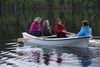 Fire kvinner fra Tiller ACT i båt