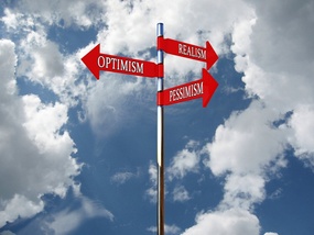 Skilt med optimisme, pessimisme og realisme
